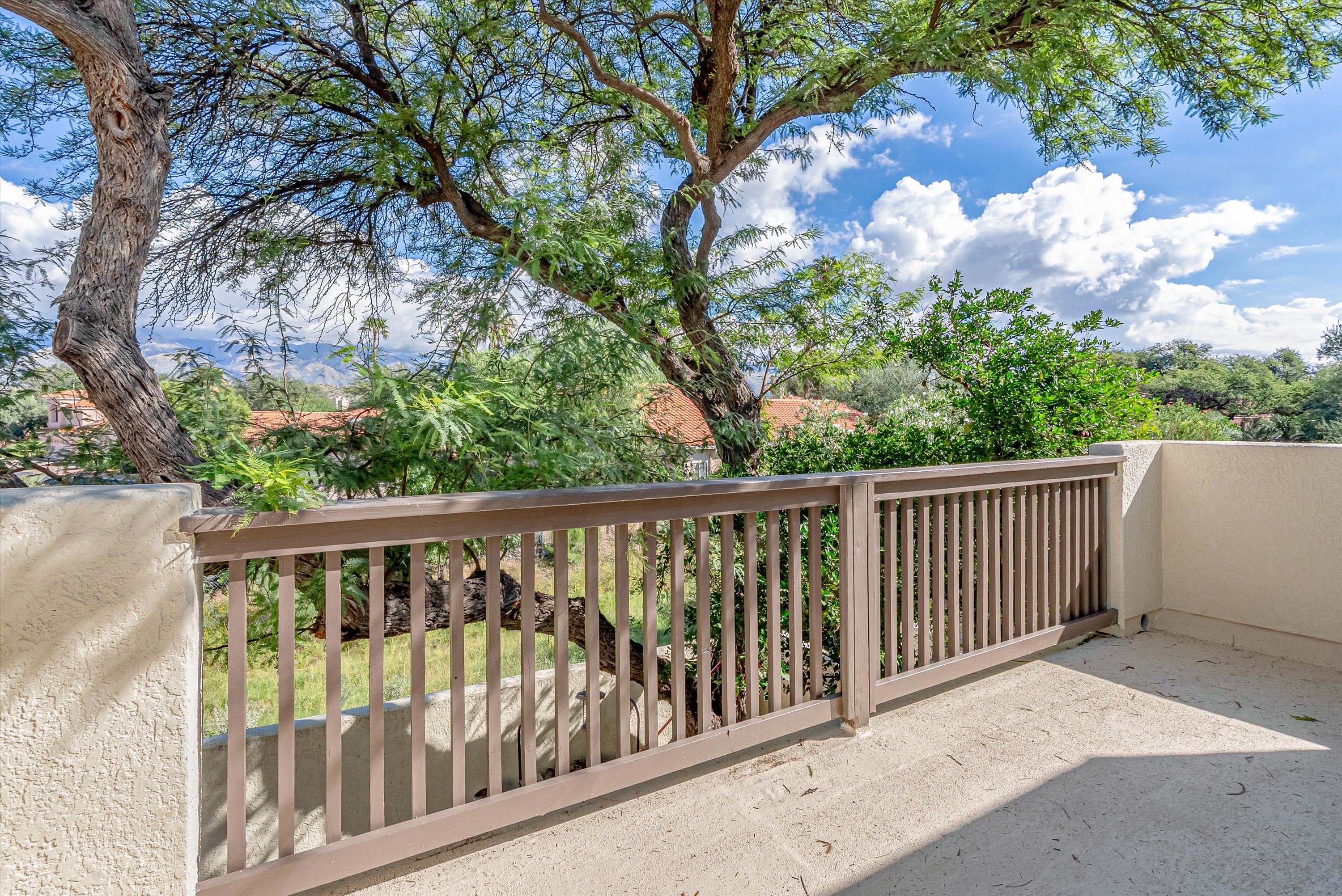 Private primary bedroom balcony overlooking the Catalina Mountains