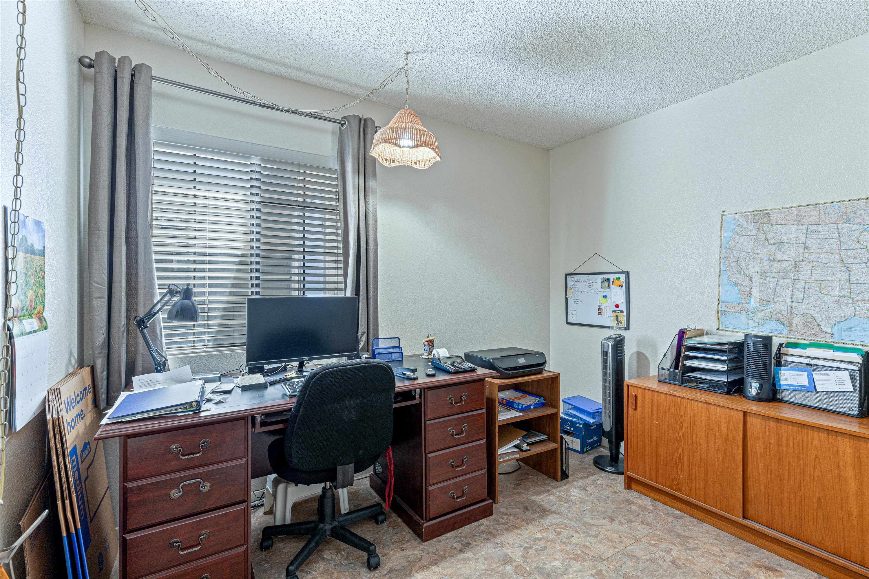 bedroom is currently used as a home office, demonstrating its flexibility for work, hobbies or guests.