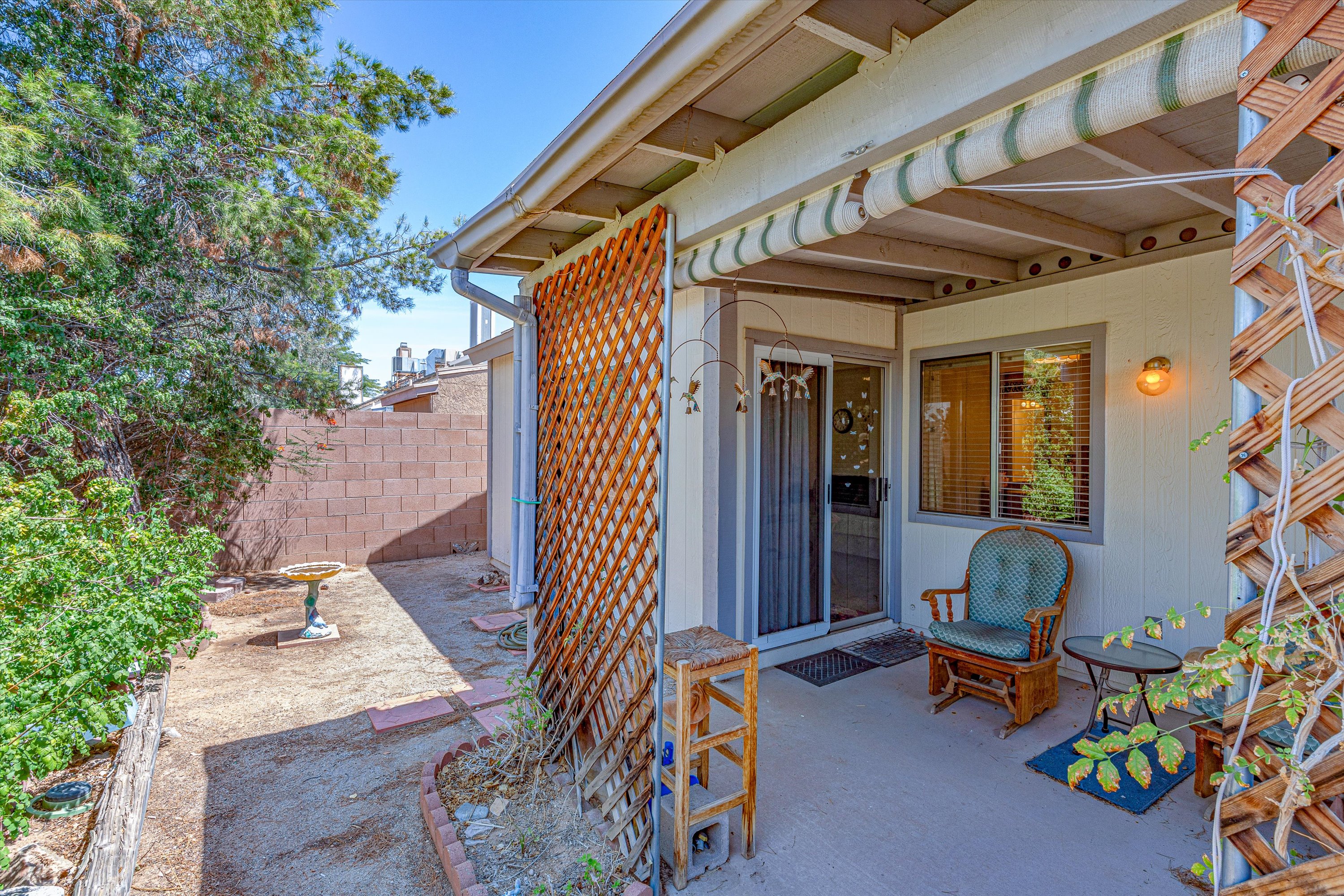Low-maintenance backyard with covered patio at a Star Trails Estates home in Tucson