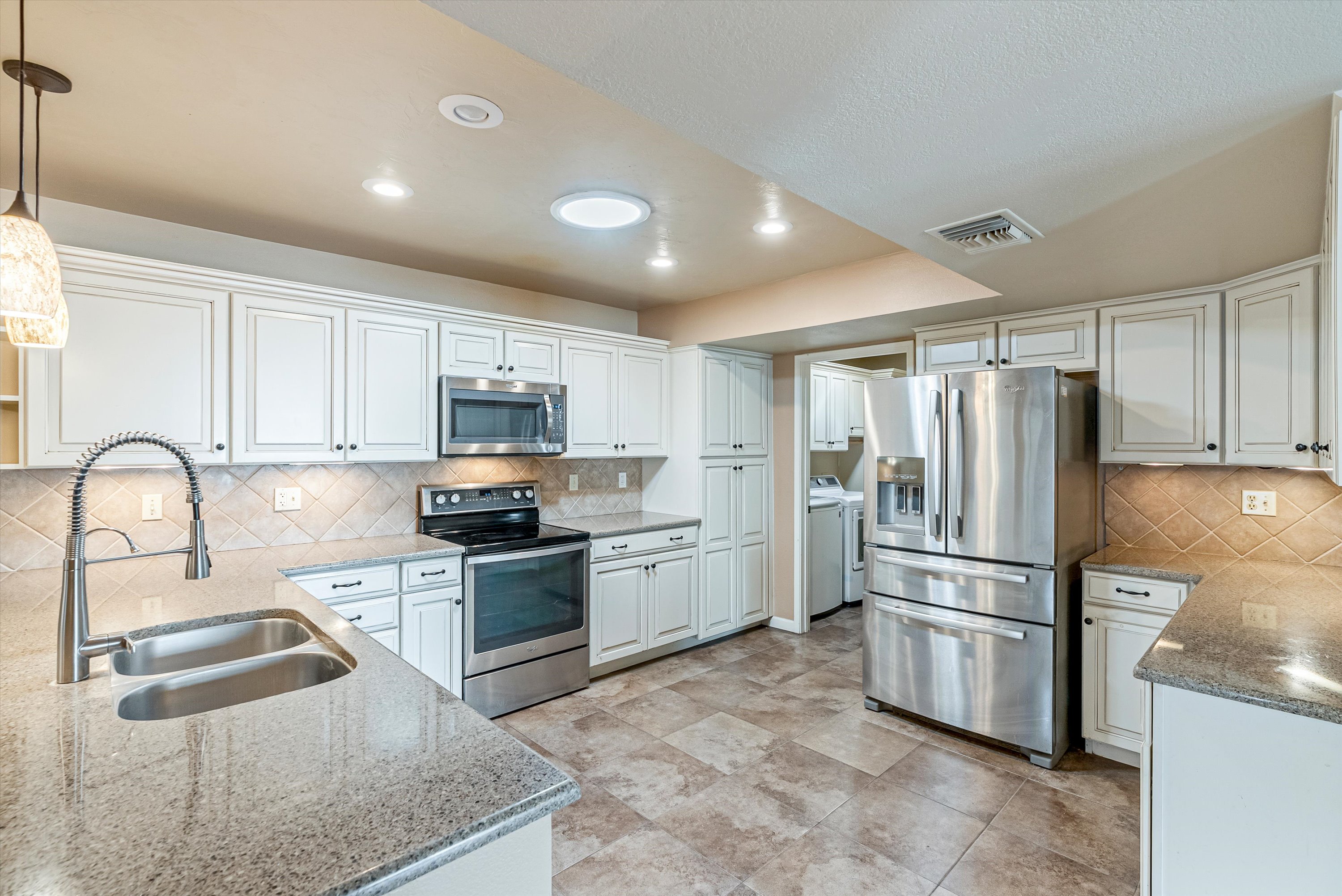 Updated kitchen with custom cabinetry at 7345 E Cascada Circle